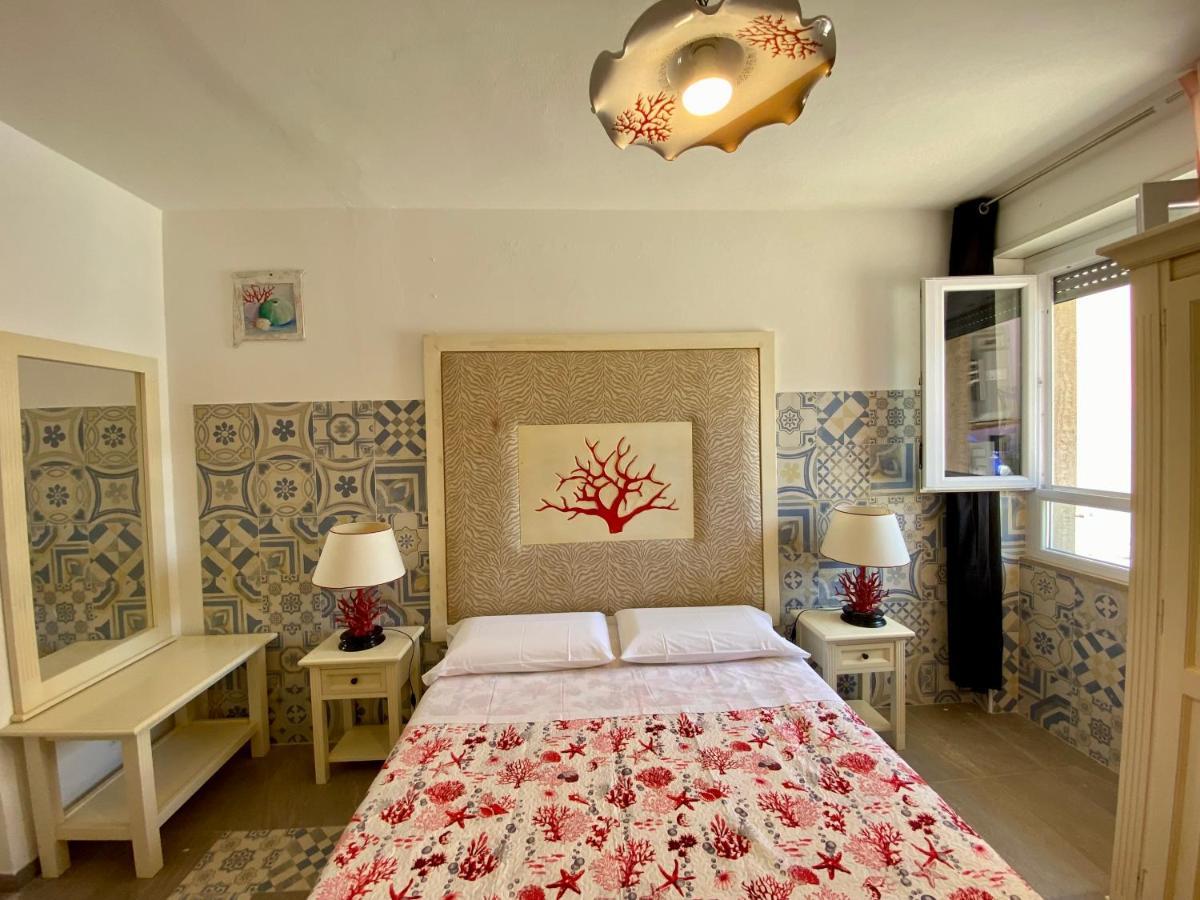 Casetta Al Mare Isola Rossa Habitación foto