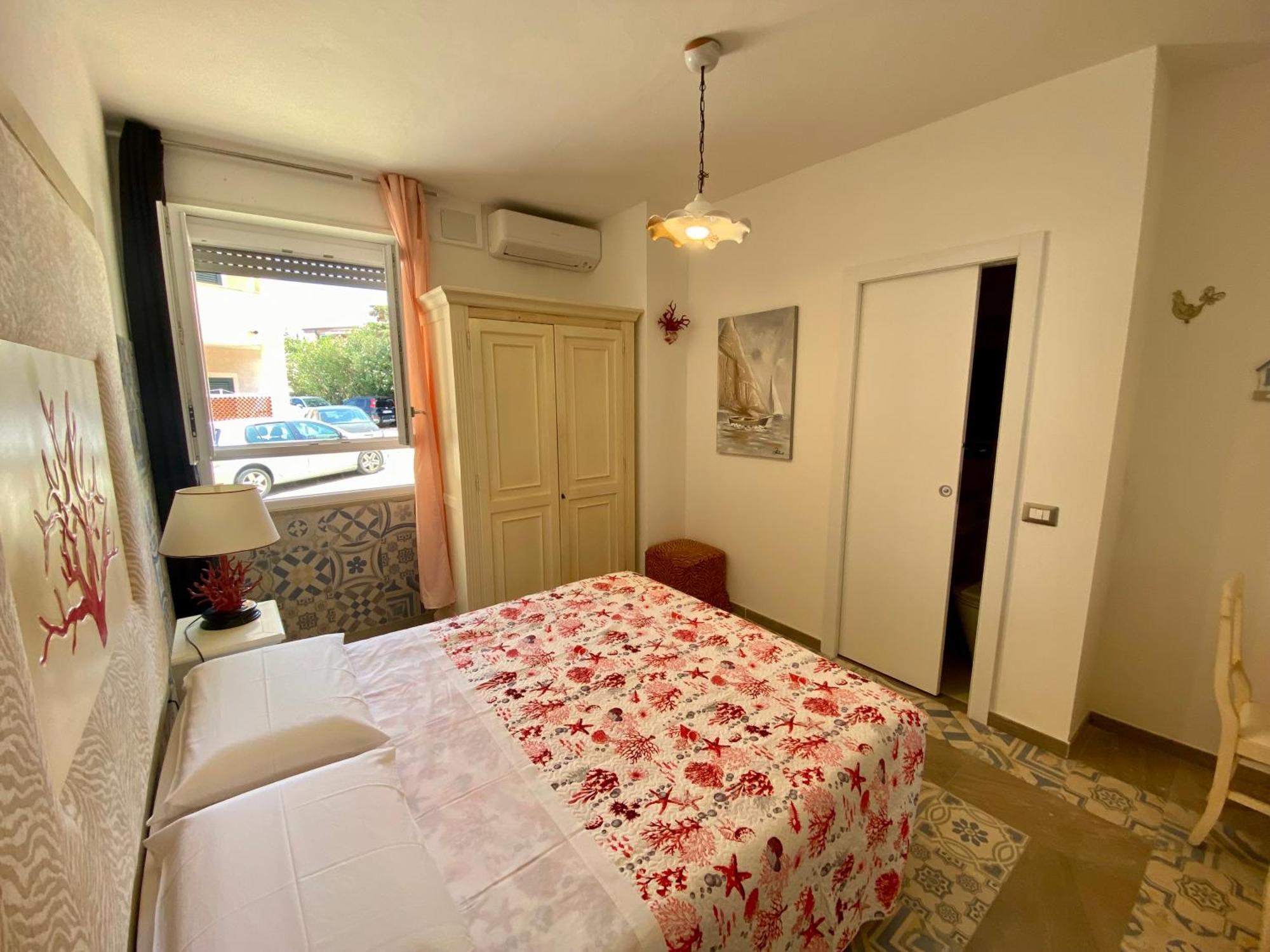 Casetta Al Mare Isola Rossa Habitación foto