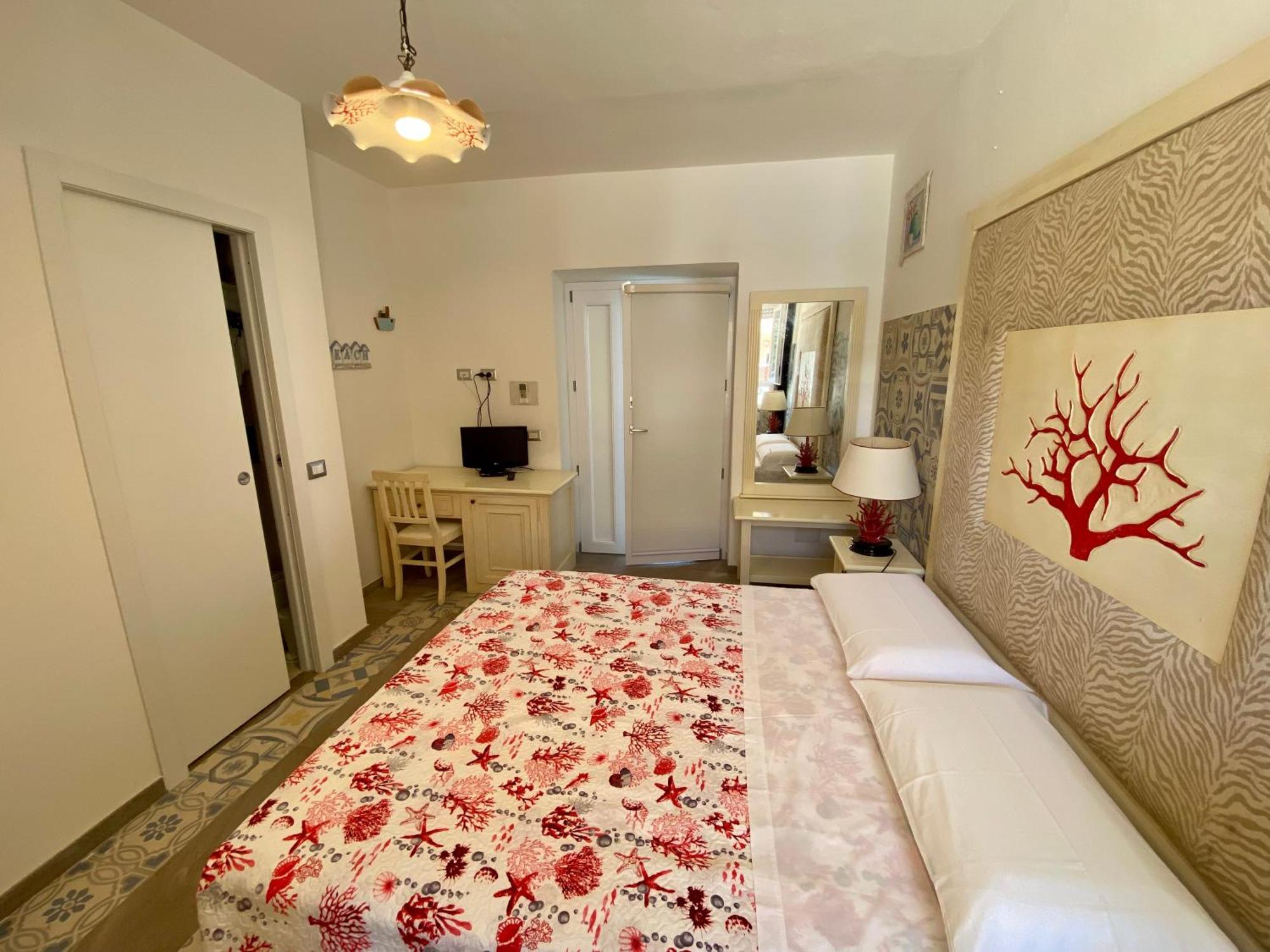 Casetta Al Mare Isola Rossa Habitación foto