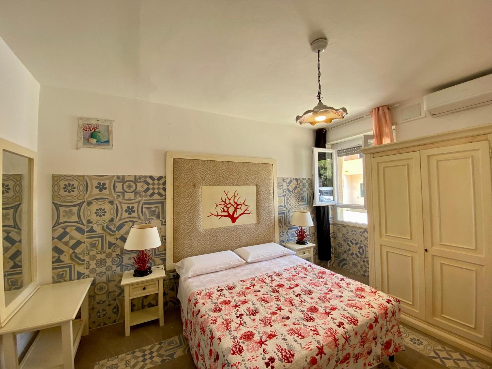 Casetta Al Mare Isola Rossa Habitación foto
