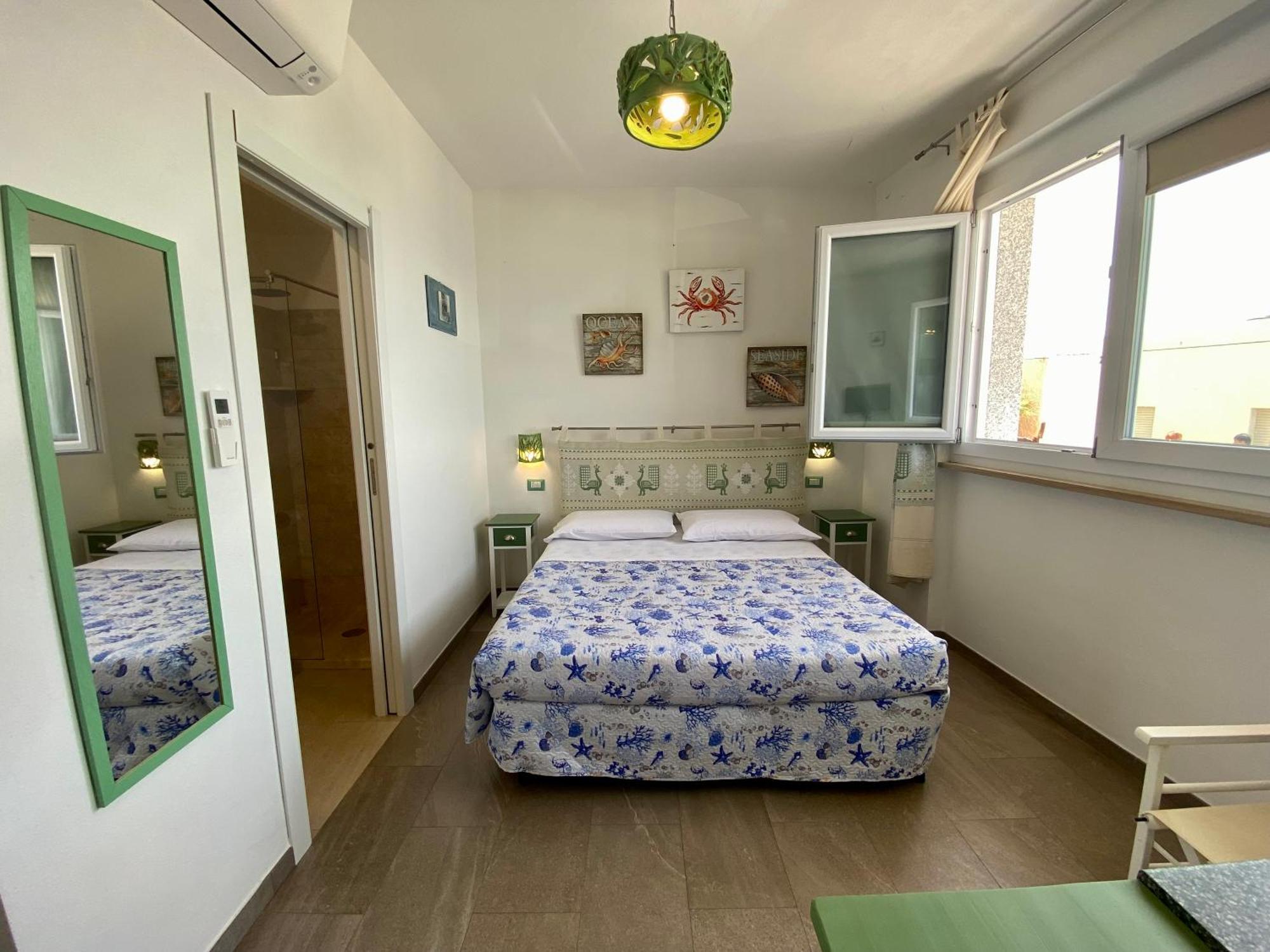 Casetta Al Mare Isola Rossa Habitación foto