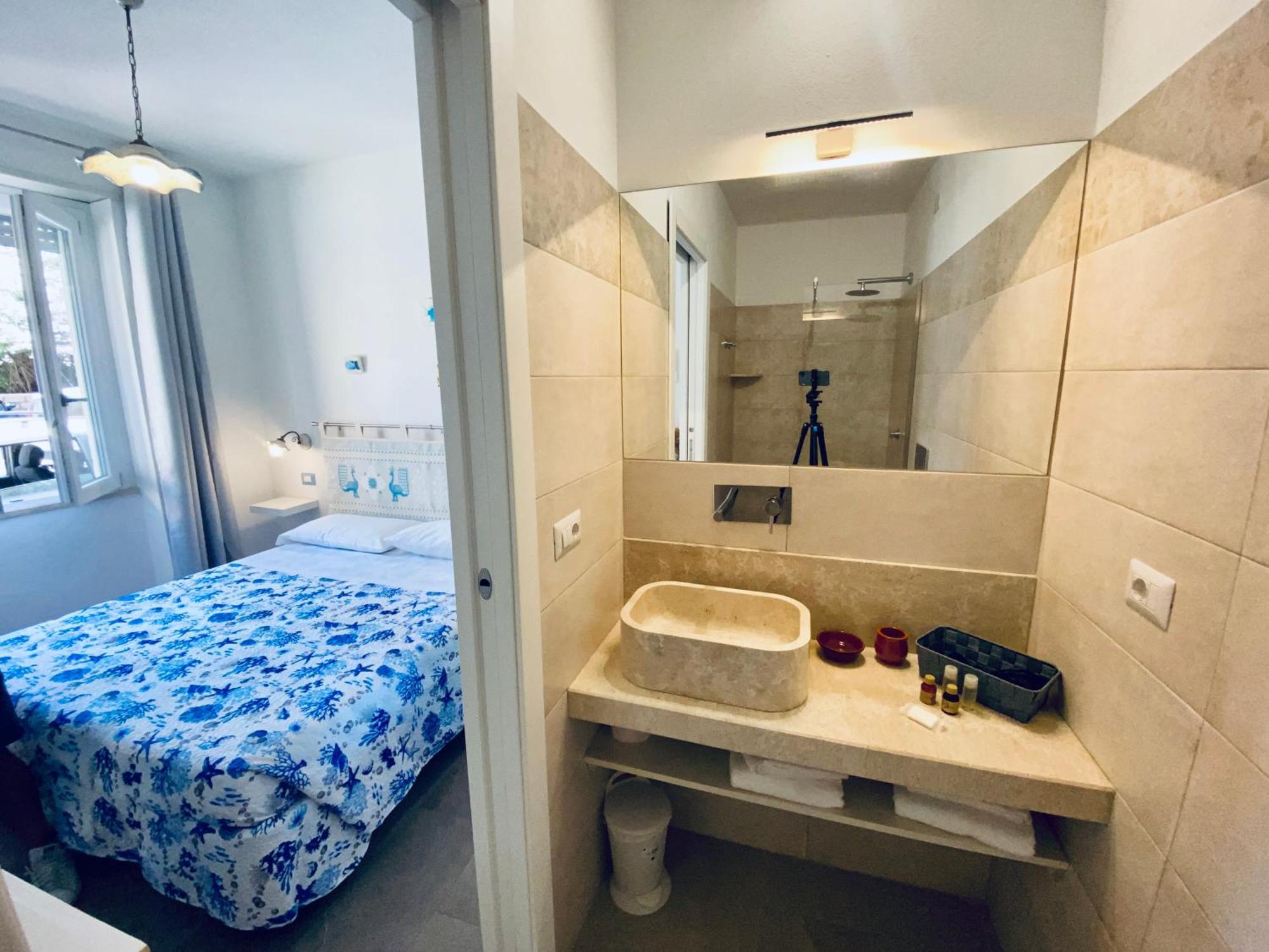 Casetta Al Mare Isola Rossa Habitación foto
