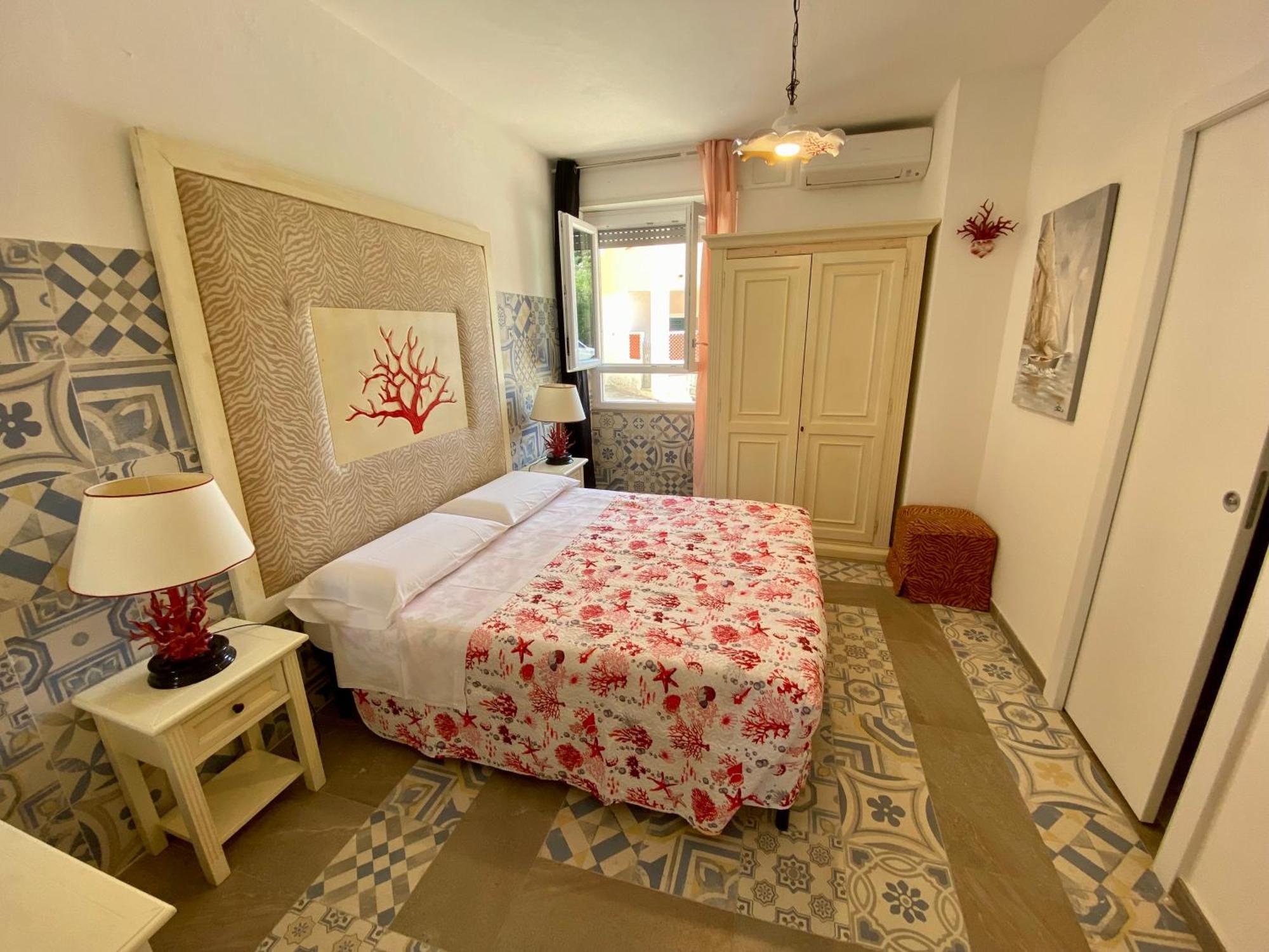 Casetta Al Mare Isola Rossa Habitación foto