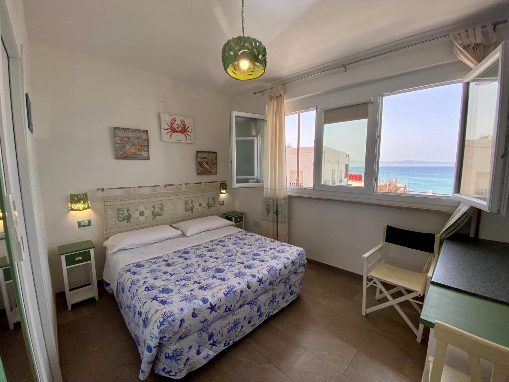Casetta Al Mare Isola Rossa Habitación foto